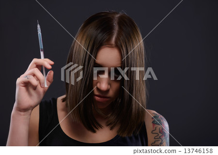 Teenage girl suffering from drug addiction Teenage girl suffering from drug addiction 13746158