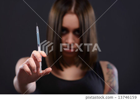 Teenage girl suffering from drug addiction Teenage girl suffering from drug addiction 13746159
