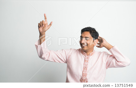 Indian in traditional clothes in dancing pose Indian in traditional clothes in dancing pose 13751549