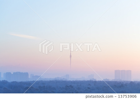 blue pink sky over city and TV tower in sunrise 13753906
