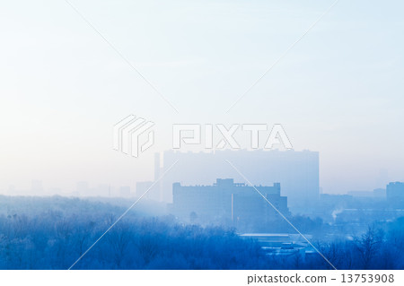 blue sunrise sky over city in cold winter 13753908