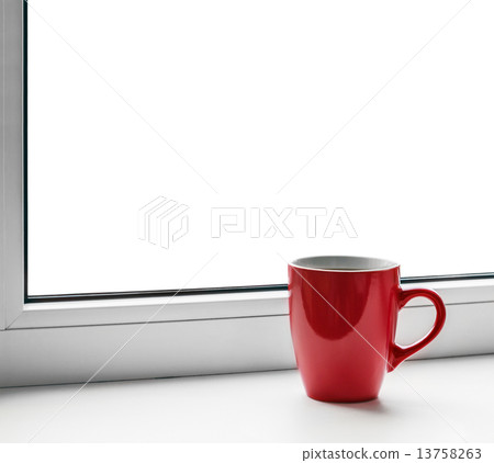 red cup on the windowsill isolated 13758263