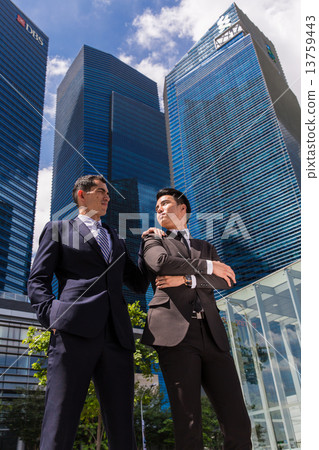 Business man infront building Business man infront building 13759443