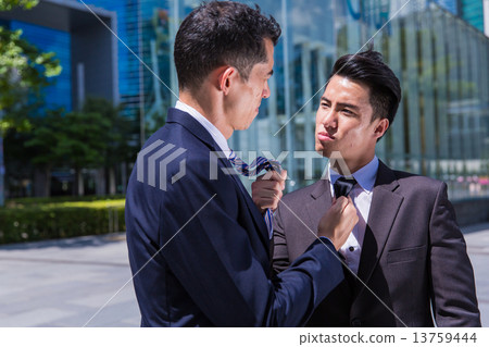Business man fighting 13759444