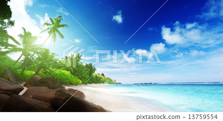 beach in sunset time on Mahe island in Seychelles 13759554