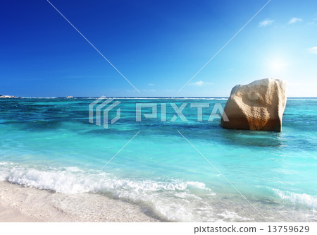 sunset on the beach, Anse Source d'Argent, La Digue island, Seyc 13759629