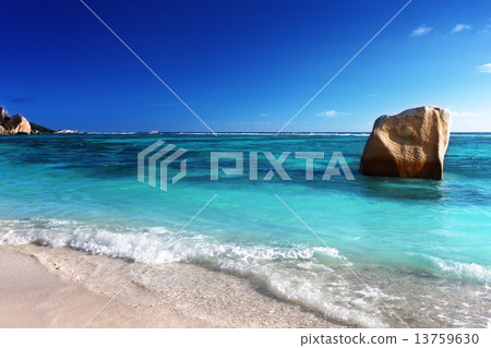 sunset on the beach, Anse Source d'Argent, La Digue island, Seyc 13759630