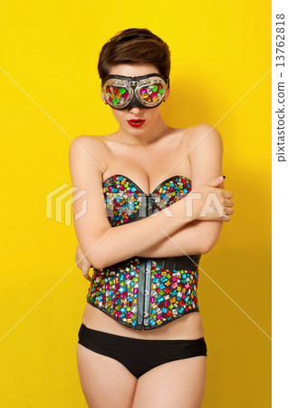 Young beautiful girl in fashionable clothes Leather punk and sunglasses 13762818