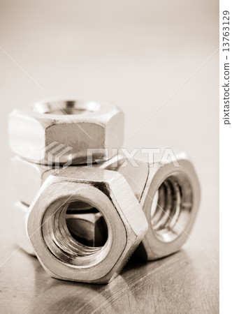 nuts tool at metal background 13763129