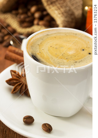 cup of coffee on wood 13763214