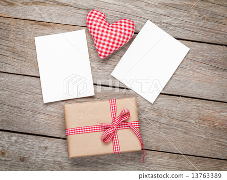 Valentines day toy heart, blank photo frames and gift box 13763389