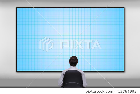 businessman looking to plasma panel businessman looking to plasma panel 13764992