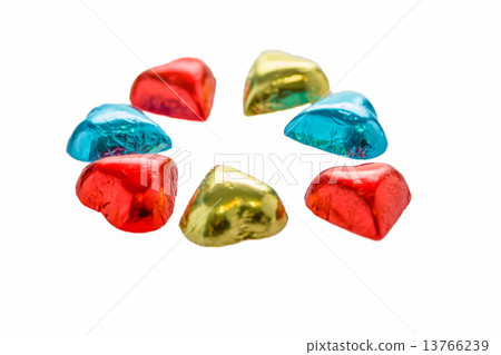 Colorful chocolate hearts on isolated white background Colorful chocolate hearts on isolated white background 13766239