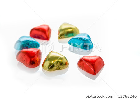 Colorful chocolate hearts on isolated white background Colorful chocolate hearts on isolated white background 13766240