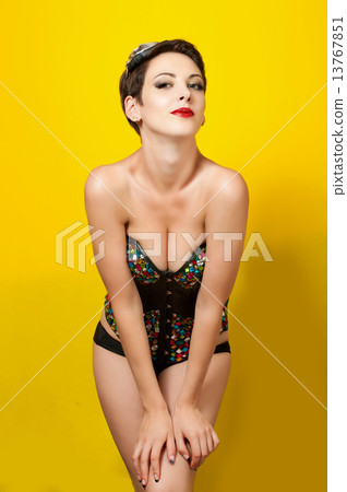 Young beautiful girl in fashionable clothes Leather punk and sunglasses 13767851