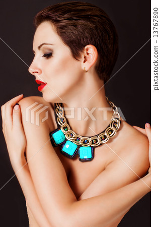 Young beautiful girl with a big jewelry Young beautiful girl with a big jewelry 13767890