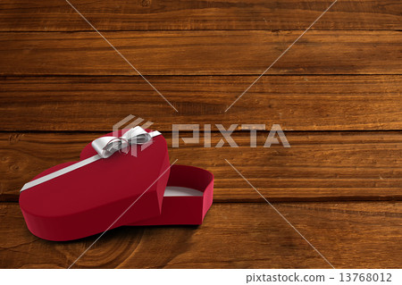 Open red heart shaped candy box 13768012