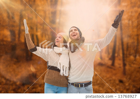 Composite image of young winter couple Composite image of young winter couple 13768927