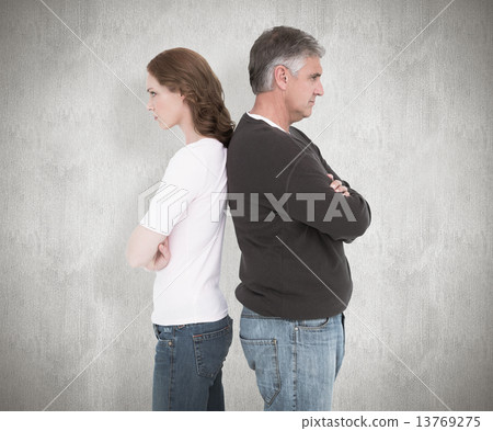 Composite image of casual couple not speaking after fight 13769275