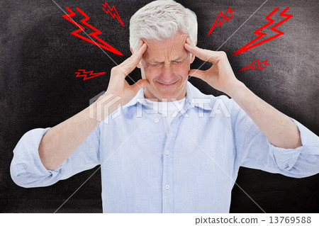 Composite image of man with headache Composite image of man with headache 13769588