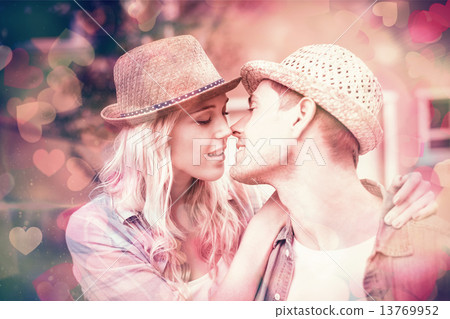 Hip young couple about to kiss 13769952