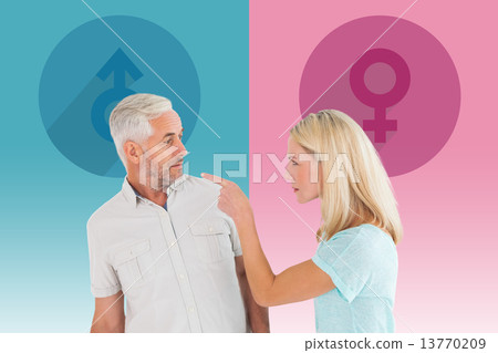 Composite image of unhappy couple having an argument 13770209