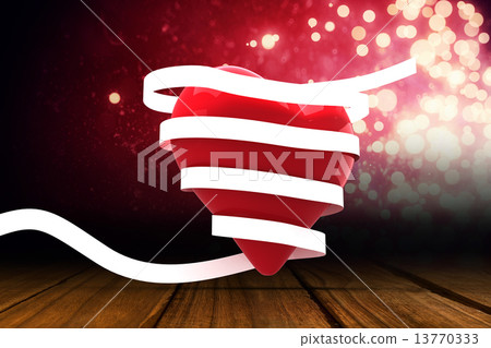 Composite image of love heart wrapped in ribbon Composite image of love heart wrapped in ribbon 13770333