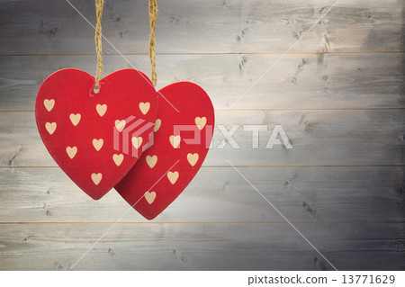 Composite image of cute heart decorations Composite image of cute heart decorations 13771629