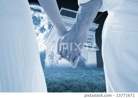 Composite image of bride and groom holding hands close up Composite image of bride and groom holding hands close up 13771671