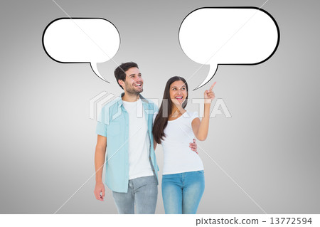Composite image of happy casual couple walking together 13772594