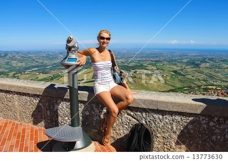 Attractive girl on the observation deck fortresses of San Marino Attractive girl on the observation deck fortresses of San Marino 13773630