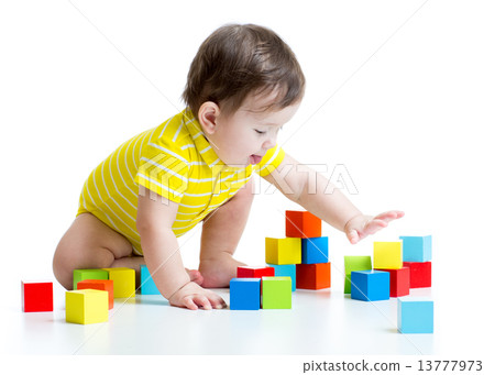 kid boy playing wooden toys kid boy playing wooden toys 13777973