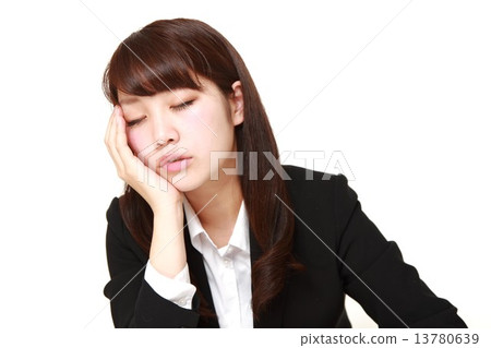Drowsy business woman 13780639