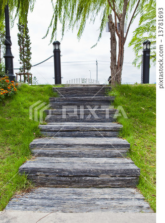 Wood stair way in a garden Wood stair way in a garden 13781693