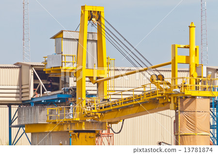 Goods on conveyor belt with crane 13781874