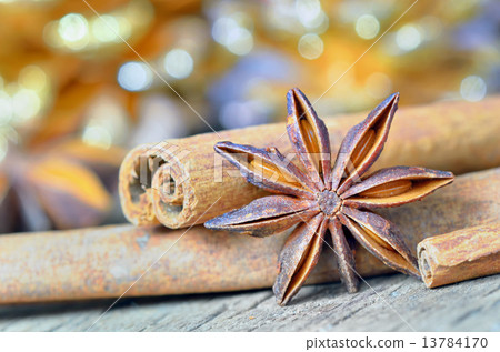 extremely closeup view of anise star and cinnamon sticks 13784170