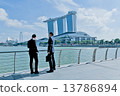 Two businessman are waiting for the client in front of Marina Bay Sands 13786894