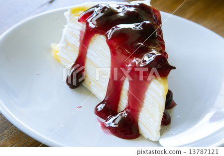 Crape cake with sweet blueberry sauce Crape cake with sweet blueberry sauce 13787121