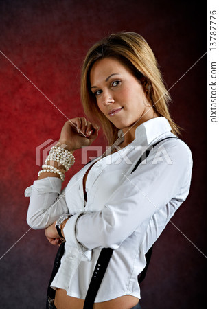 Young woman wearing sexy clothes with suspenders Young woman wearing sexy clothes with suspenders 13787776