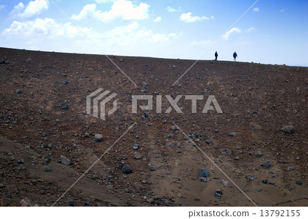 Two silhouettes on the edge of the Grand Crater, island Volcano, Two silhouettes on the edge of the Grand Crater, island Volcano, 13792155