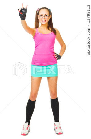 Smiling schoolgirl shows victory gesture 13798112