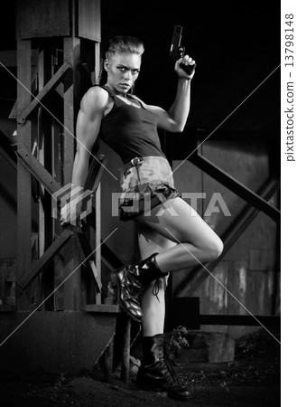 Woman in uniform with gun (monochrome version) 13798148