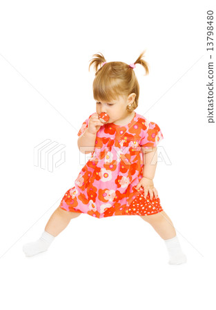 Small smiling baby in red dress with toy cup isolated Small smiling baby in red dress with toy cup isolated 13798480