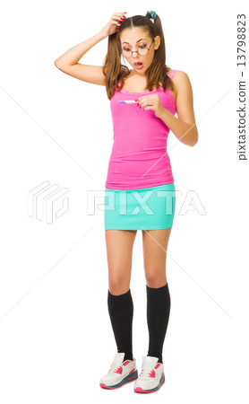 Worried schoolgirl with pregnansy test 13798823