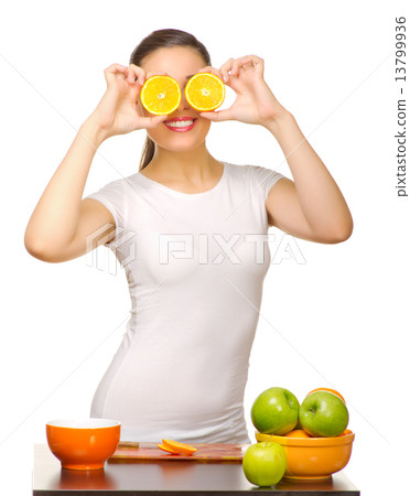 Young girl with orange slices 13799936