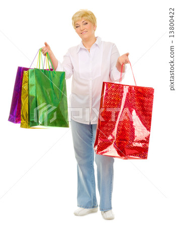 Happy senior woman with bags 13800422