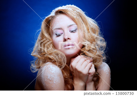 Young beautiful woman with snowy skin 13800730