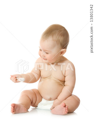 Small baby playing with spoon 13801342