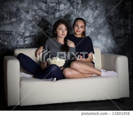 Two girls looks TV Two girls looks TV 13801856