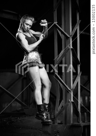 Woman in uniform with skipping rope(monochrome version) Woman in uniform with skipping rope(monochrome version) 13802135